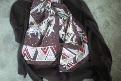 long format scarf with brown background